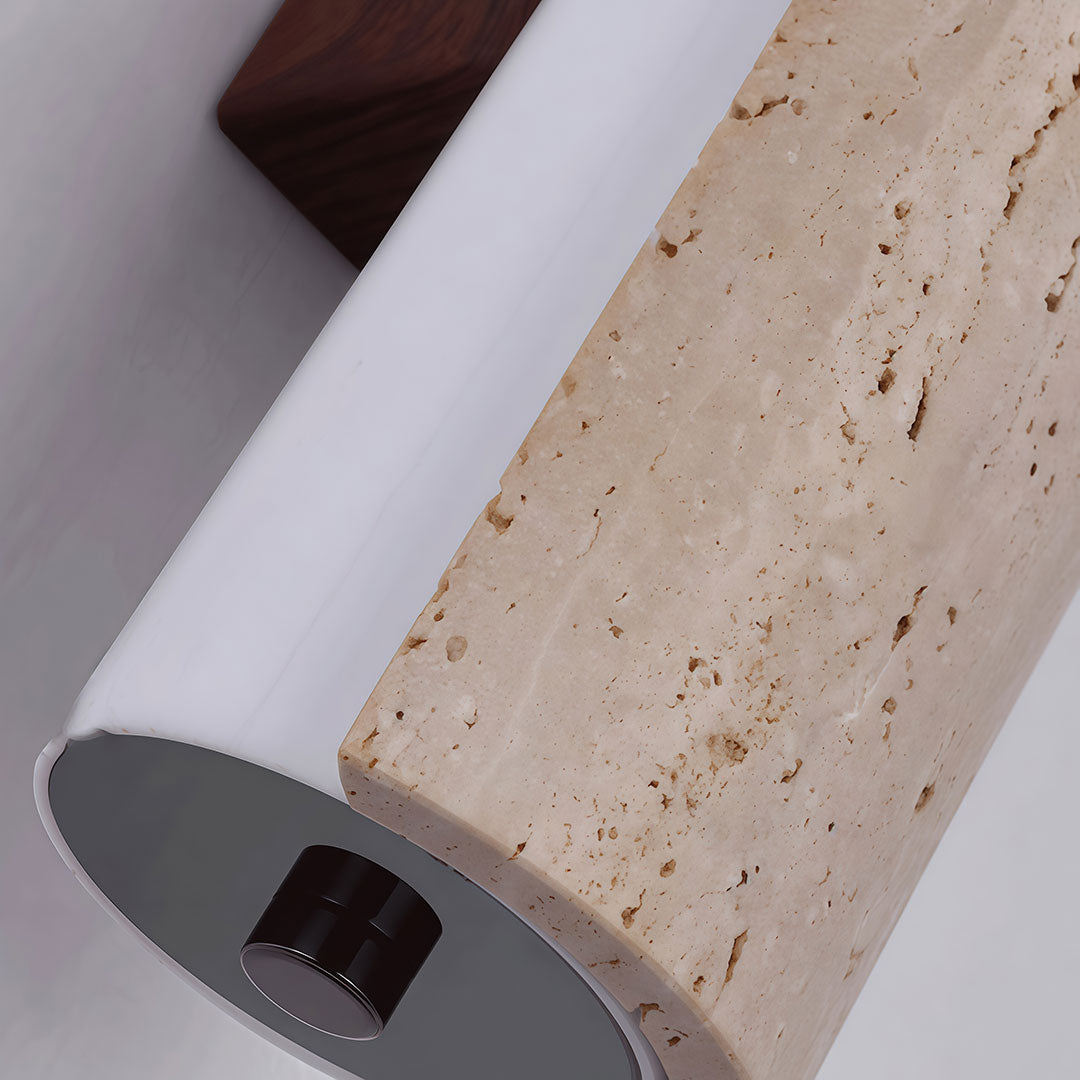 Close-up of modern LED wall lights showing the cylindrical diffuser and natural stone texture.