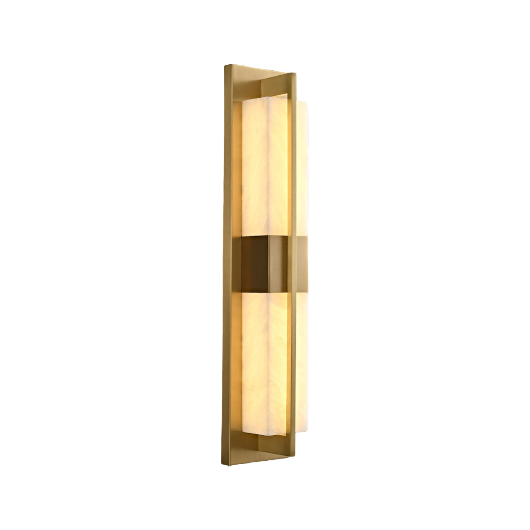 Modern linear gold wall lighting fixture with a warm glow isolated on a white studio background