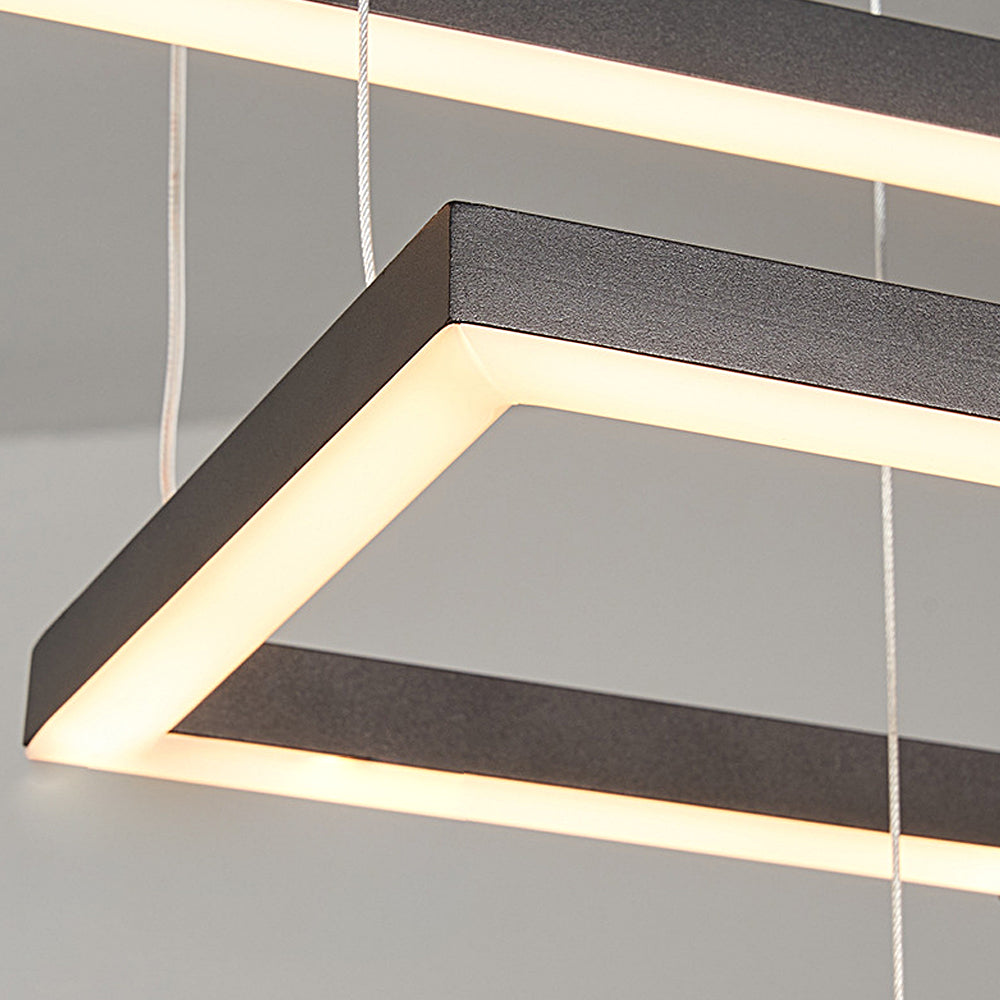 Modern linear LED chandelier with a close-up of the geometric light fixture.
