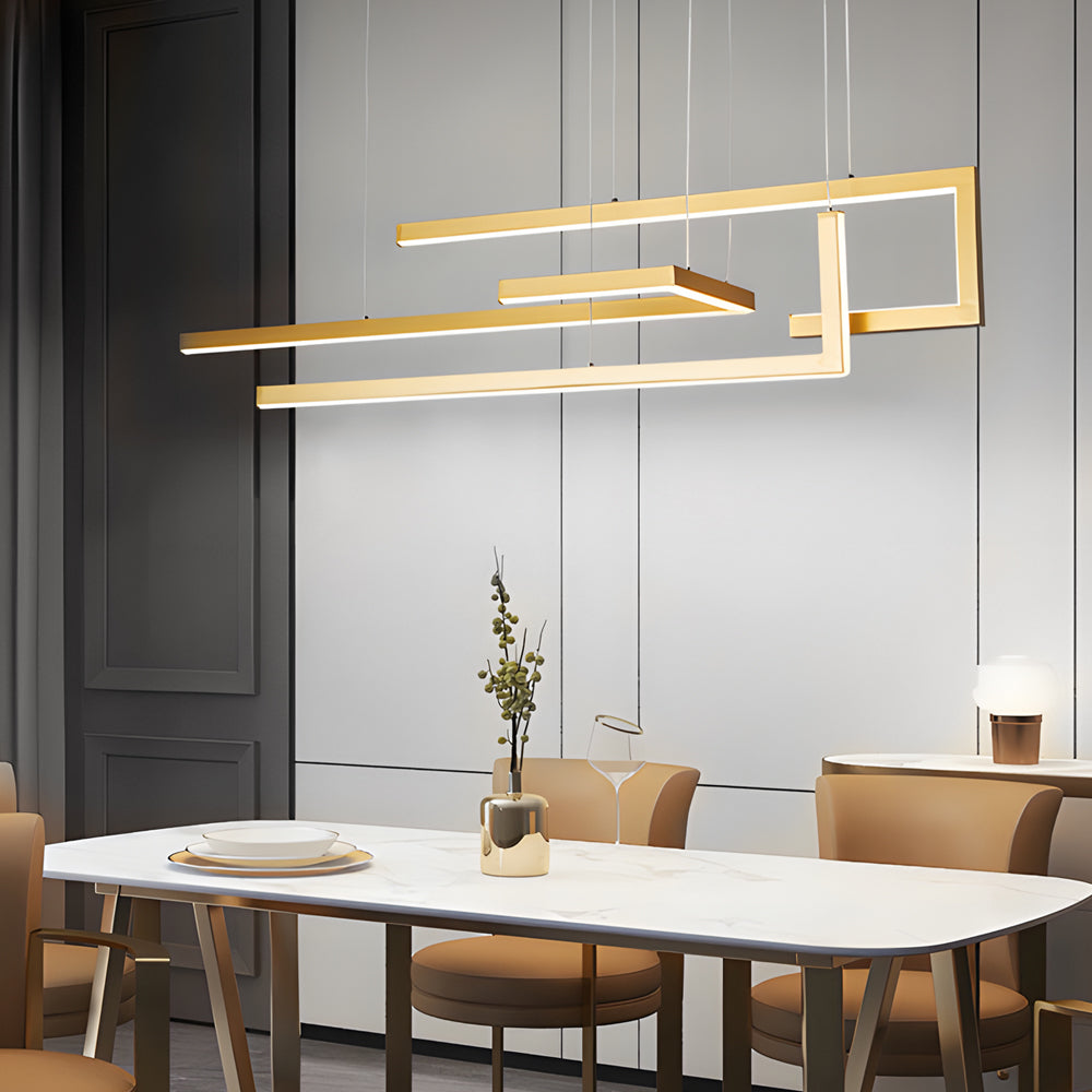 Modern linear LED chandelier providing warm light in a cozy dining nook.