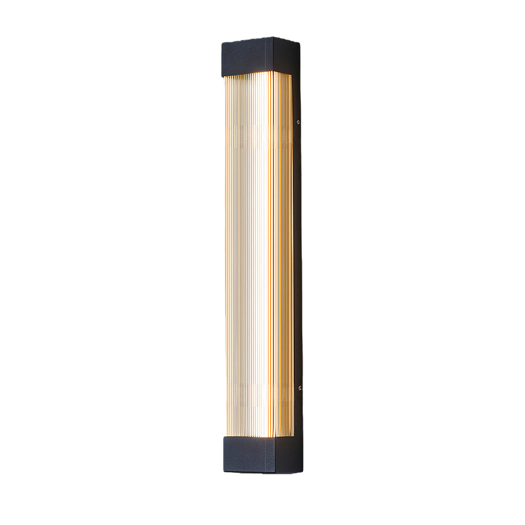 Modern linear outdoor sconce featuring a warm gold-toned finish and black frame, isolated on white.