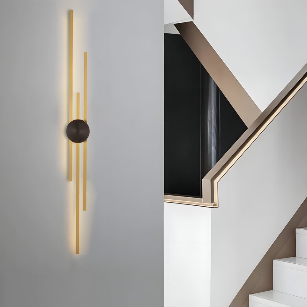Modern linear wall sconce with a sleek design, offering a sophisticated lighting solution with a stylish gold accent.