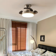 Silver ceiling fan with light in a modern living room, elegant and functional indoor lighting