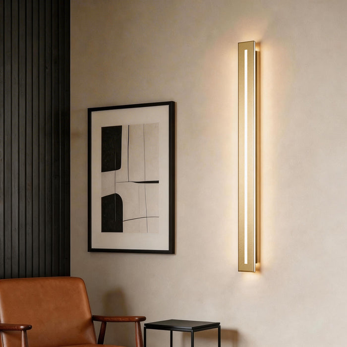 Modern minimalist gold and long black wall sconces for living room decor.