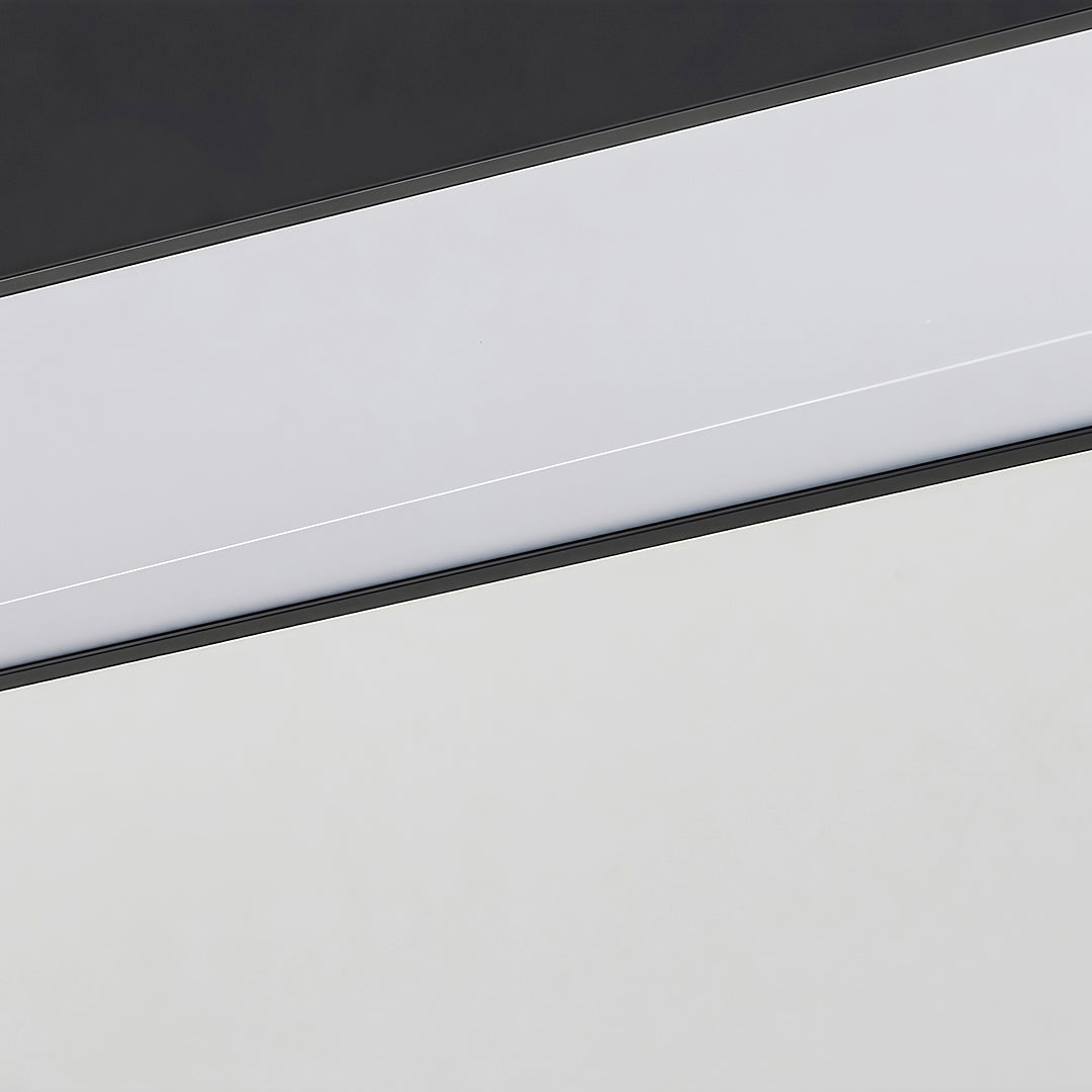 Close-up view of a modern long rectangular chandelier, showcasing its high-quality construction and design.