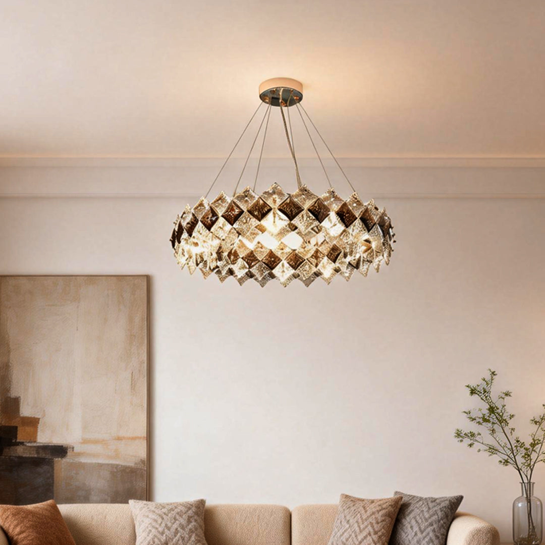 Modern luxury crystal room dining chandeliers providing soft illumination above a stylish living room.
