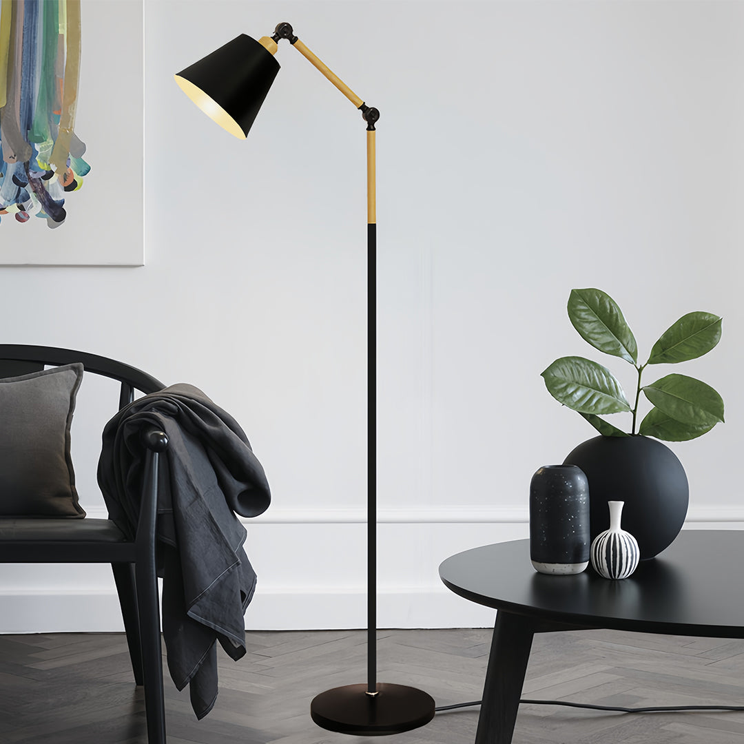 Modern metallic floor lamp with white conical shade and copper details against neutral wall background