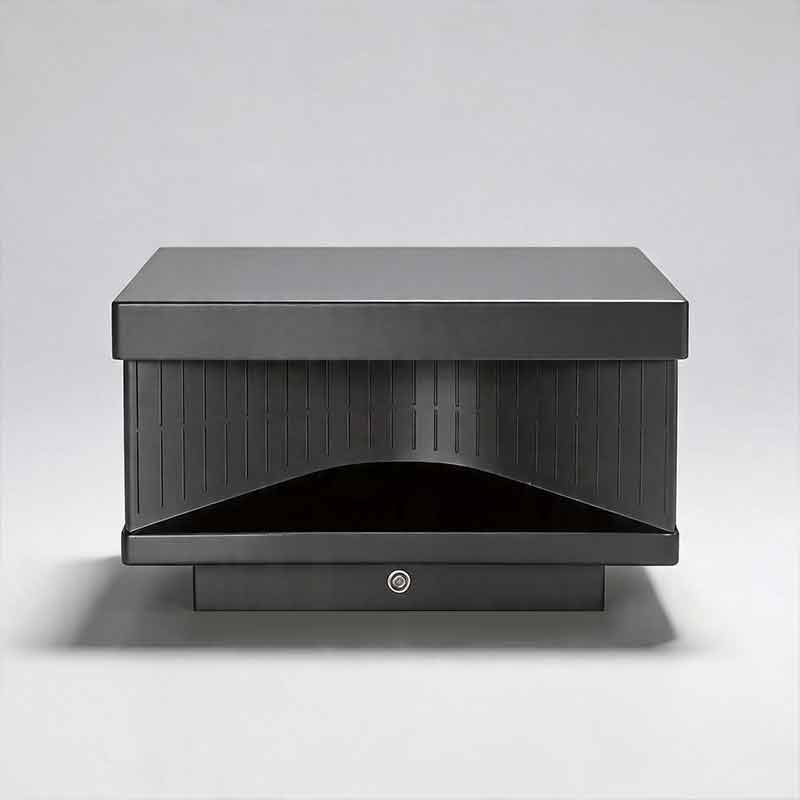 Modern minimalist black square outdoor pillar light fixture isolated on a grey studio floor.