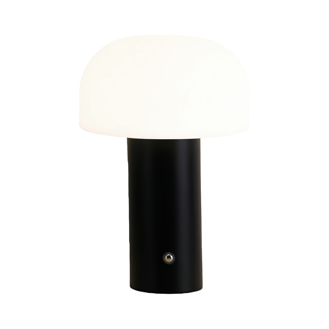 Modern novelty table lamps in sleek black finish with curved dome shade and minimalist design