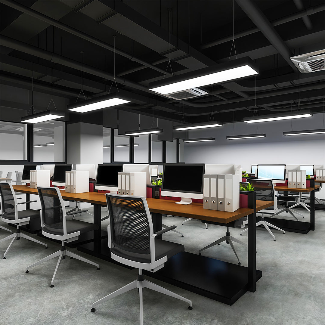 A modern long rectangular chandelier in an office meeting room, creating a professional and stylish ambiance.