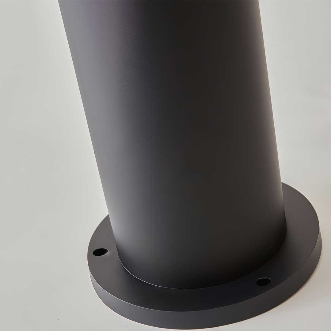 Modern outdoor bollard lights with a close-up of the light effect and design.
