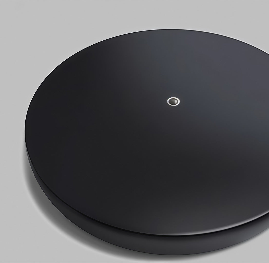 Base of a modern outdoor floor lamps, highlighting its sturdy and stylish black round design.