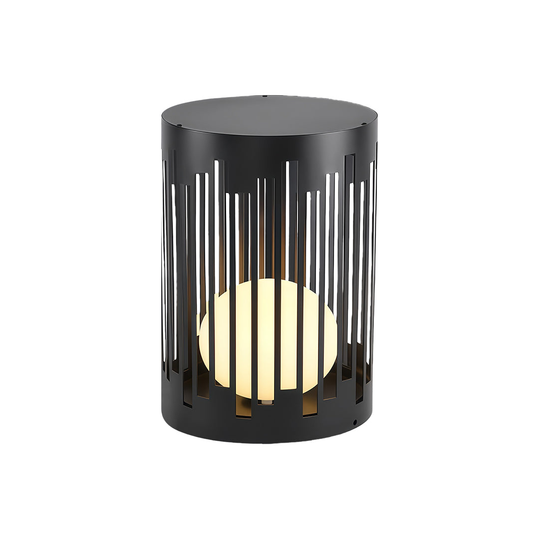 Modern outdoor lantern light featuring glass shade chandelier aesthetic in tall cylindrical design with decorative cutout pattern and warm glow.
