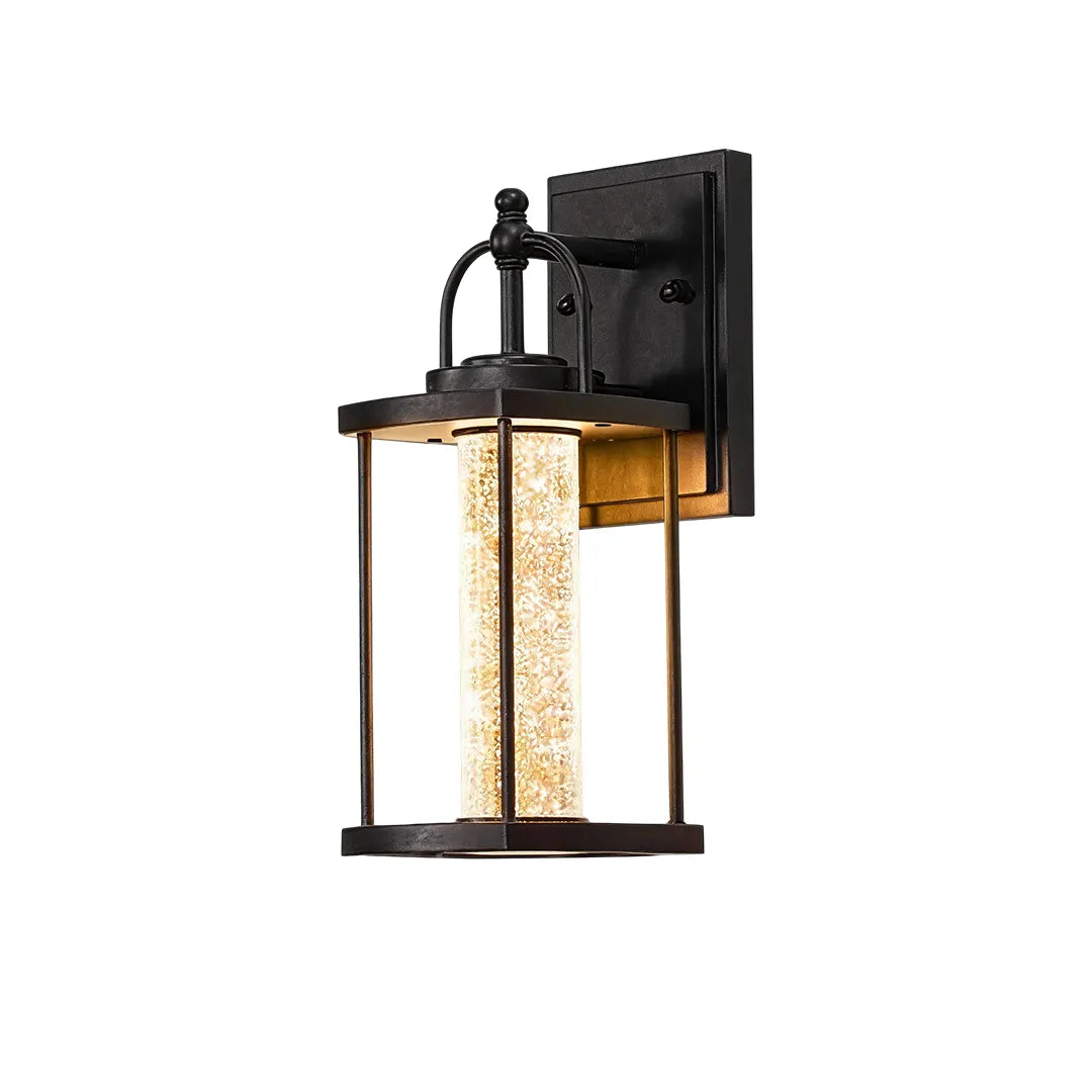 Modern outdoor lantern wall sconce product image with a curved arm and clear seeded glass lantern shade.