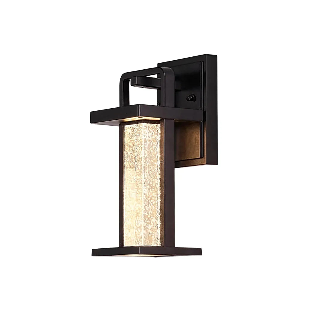 Modern outdoor lantern wall sconce product image with a rectangular frame and illuminated seeded glass panel.