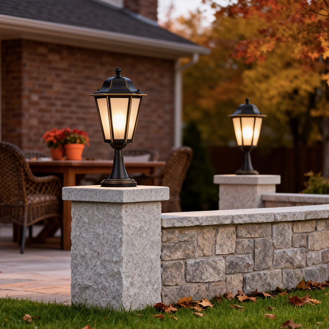 Modern outdoor pillar light on brick column, providing soft illumination for pathways and garden entrances.