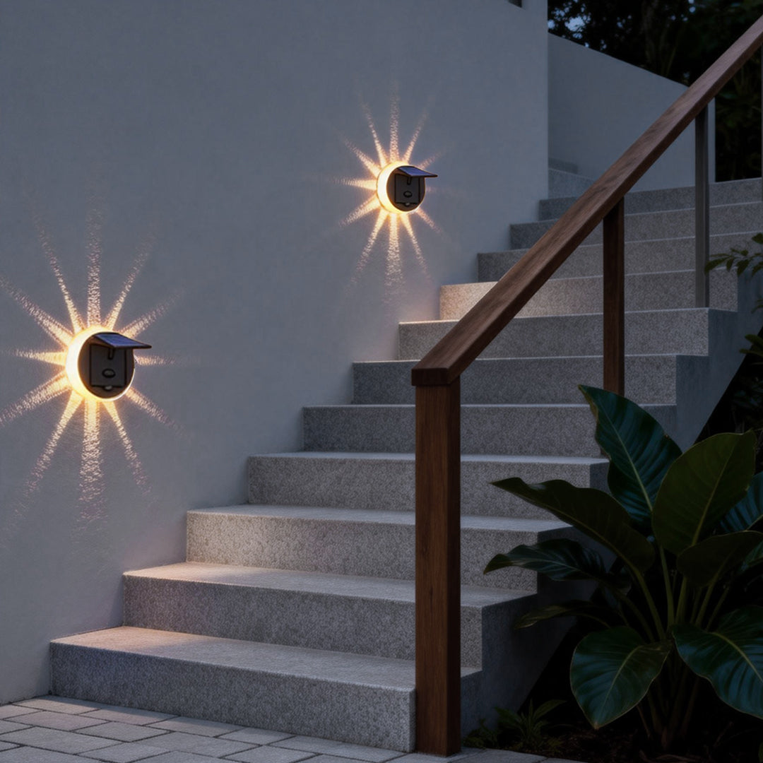 Modern outdoor patio solar lights installed along staircase railings, offering stylish and eco-friendly lighting solutions.