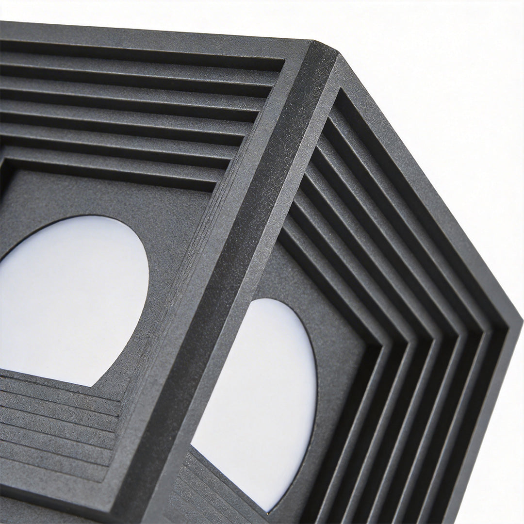Modern outdoor pillar lights with a close-up of their layered cube design.