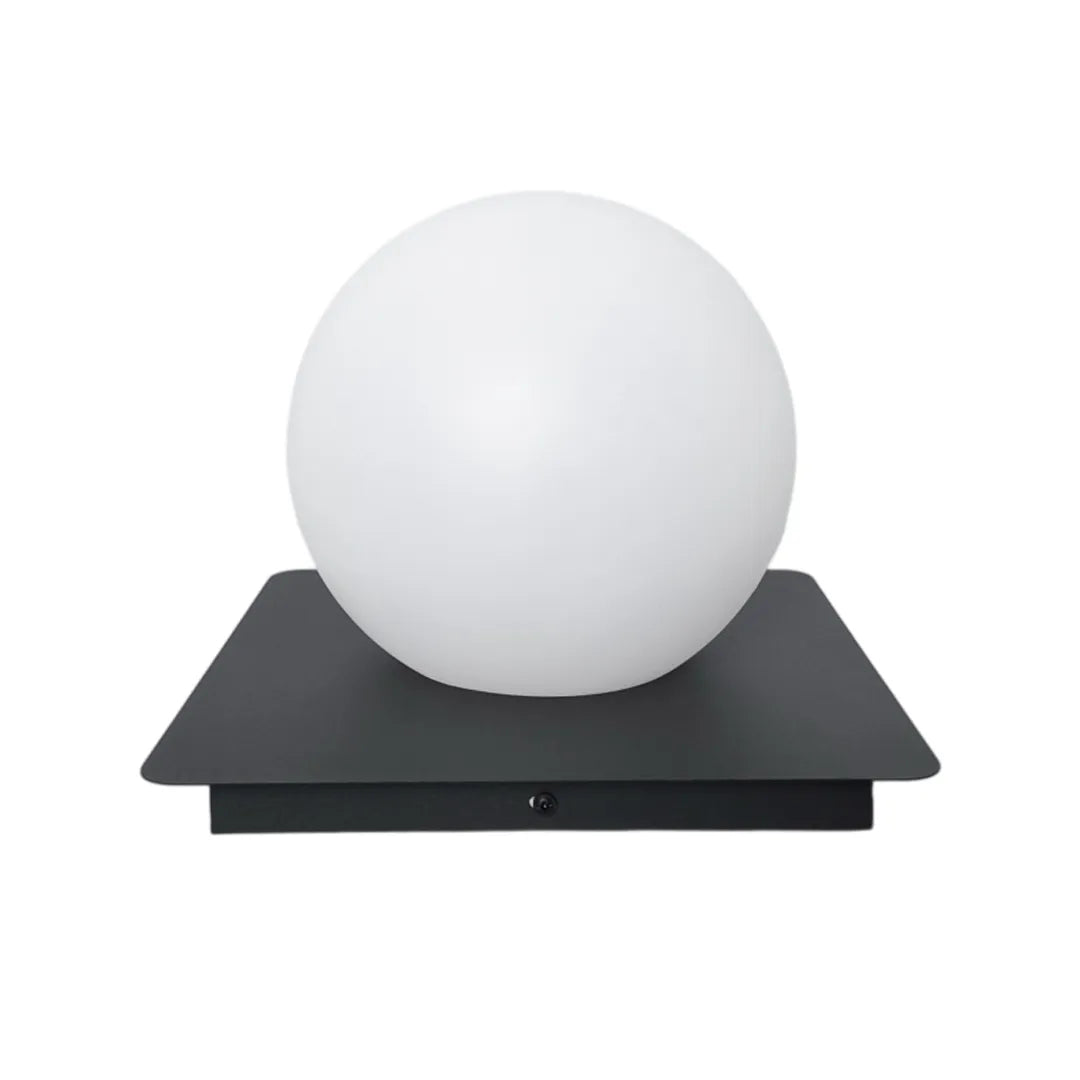 Modern outdoor pillar lights with a white round globe shade on a black square base shown on white.