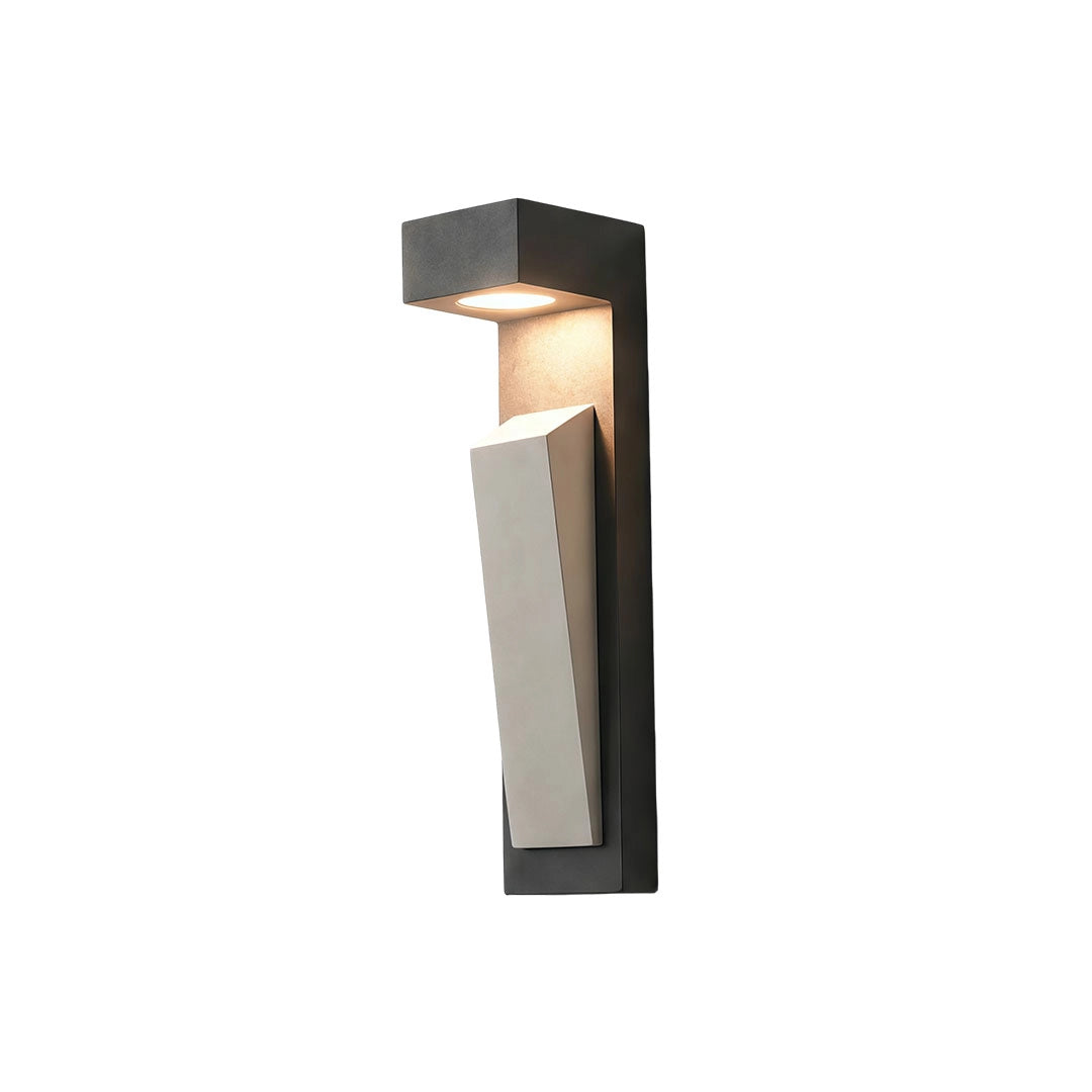 Modern outdoor wall light in a dark stone finish isolated on a white background.
