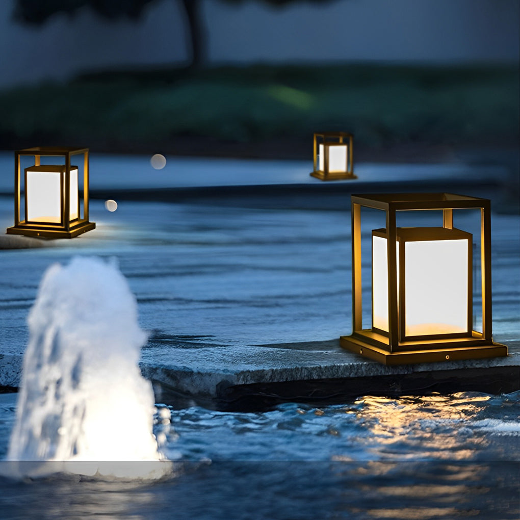 Modern outdoor wall pillar lights arranged on lawn pathway creating guided landscape lighting.
