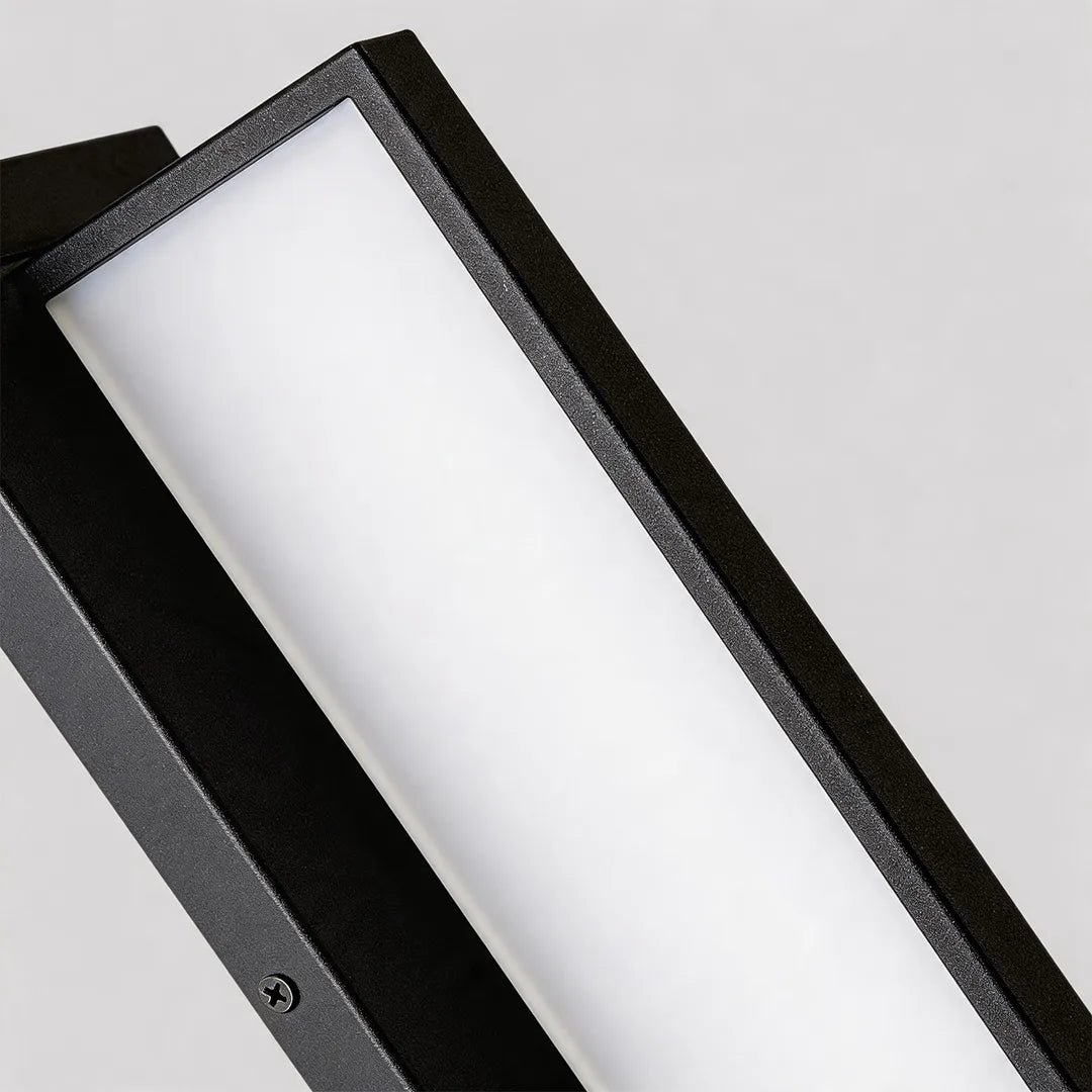 Modern outdoor wall sconce with frosted glass diffuser and black metal frame