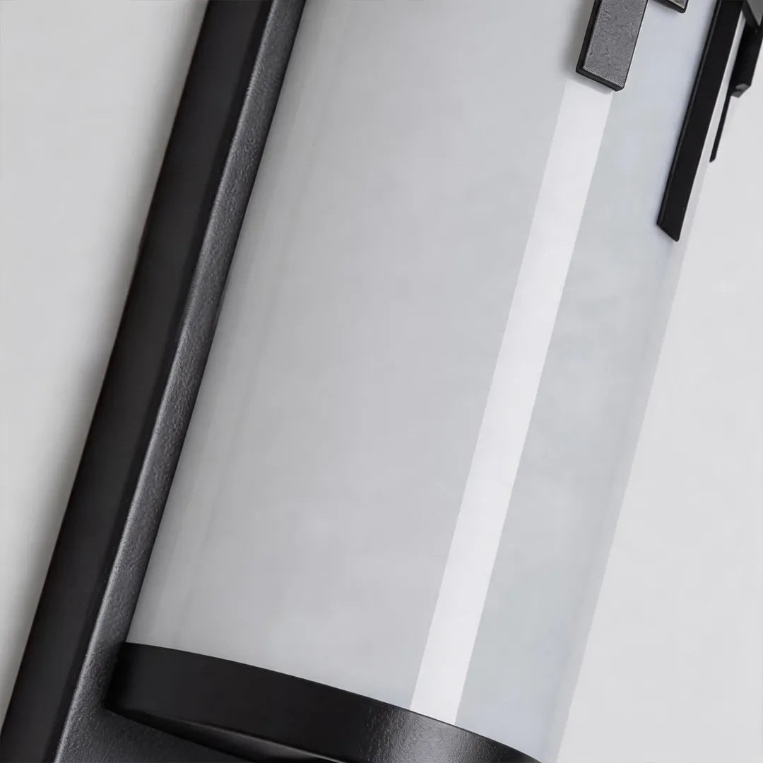 Modern outdoor wall sconce with frosted glass diffuser and black metal frame