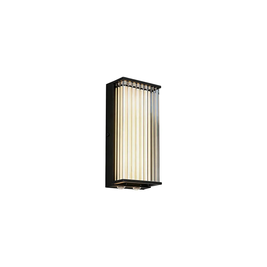 Modern outdoor wall sconce with black frame and ribbed glass side view