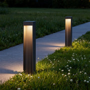 Modern path light stake with a tall black rectangular design, ideal for landscape lighting.