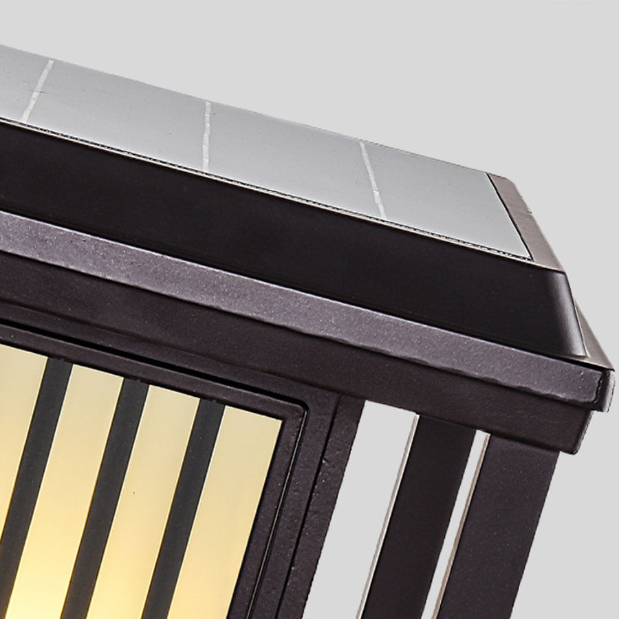 Close-up view of modern pillar light with linear metal slats and warm LED illumination