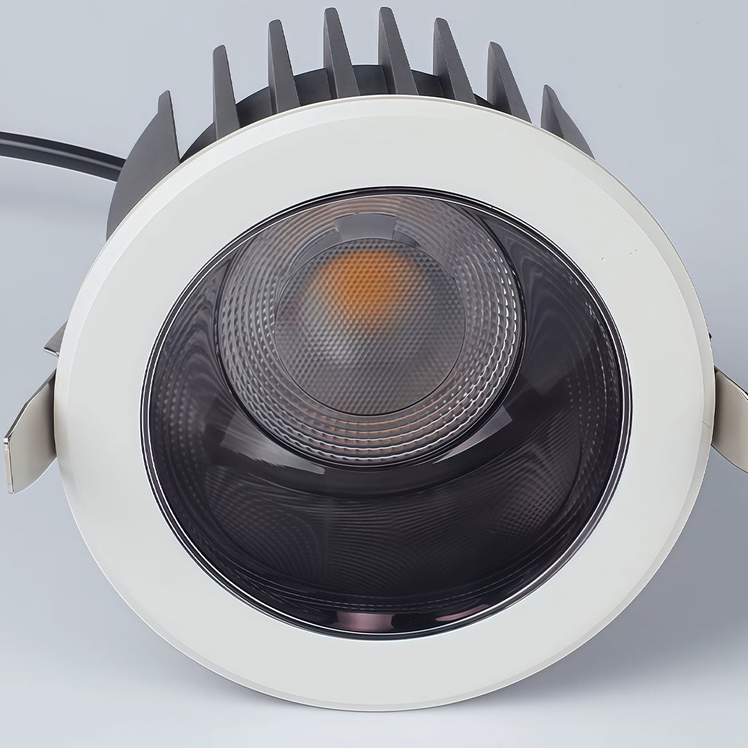 Modern recessed ceiling spotlight with black heat sink for better cooling and performance.