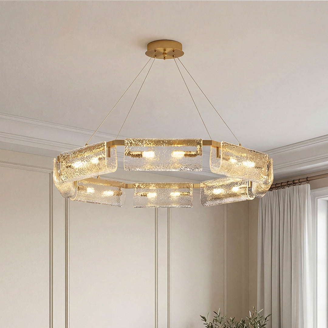 Modern rectangular glass chandelier with textured ice glass panels and a sleek gold frame.