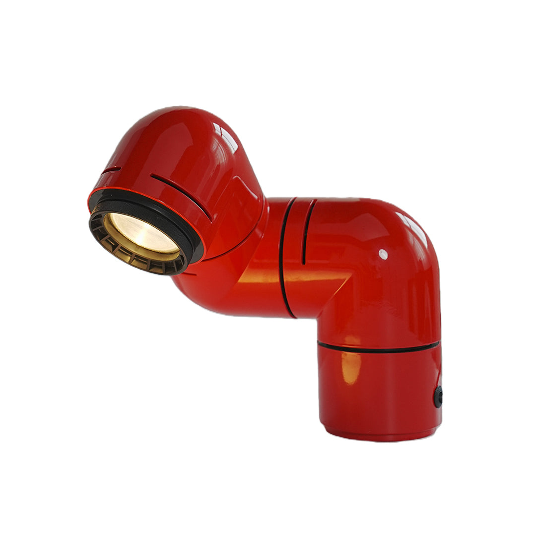 Contemporary red statement table lamps featuring glossy finish and spotlight-style head.
