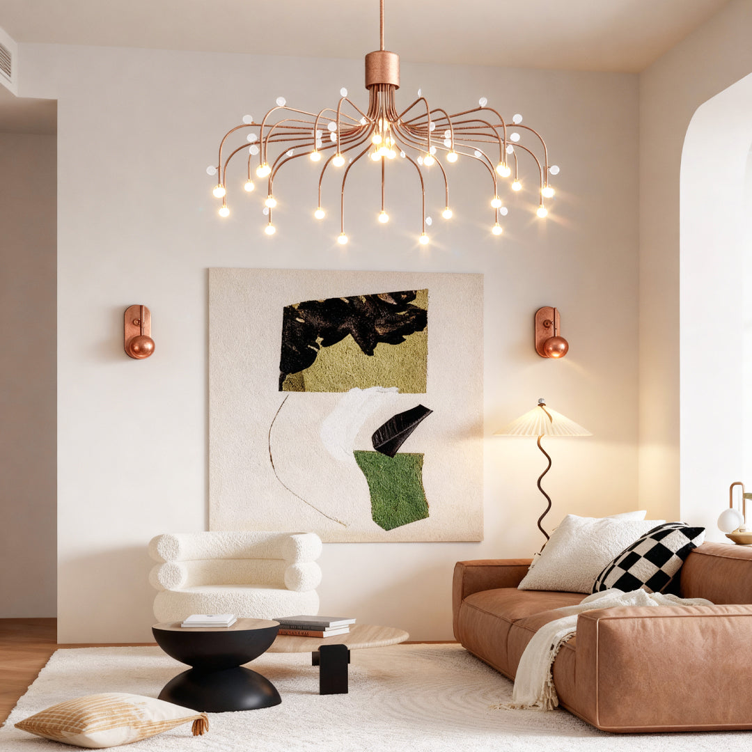 Modern retro chandelier creating statement piece in contemporary living room with rose gold sconces and neutral palette