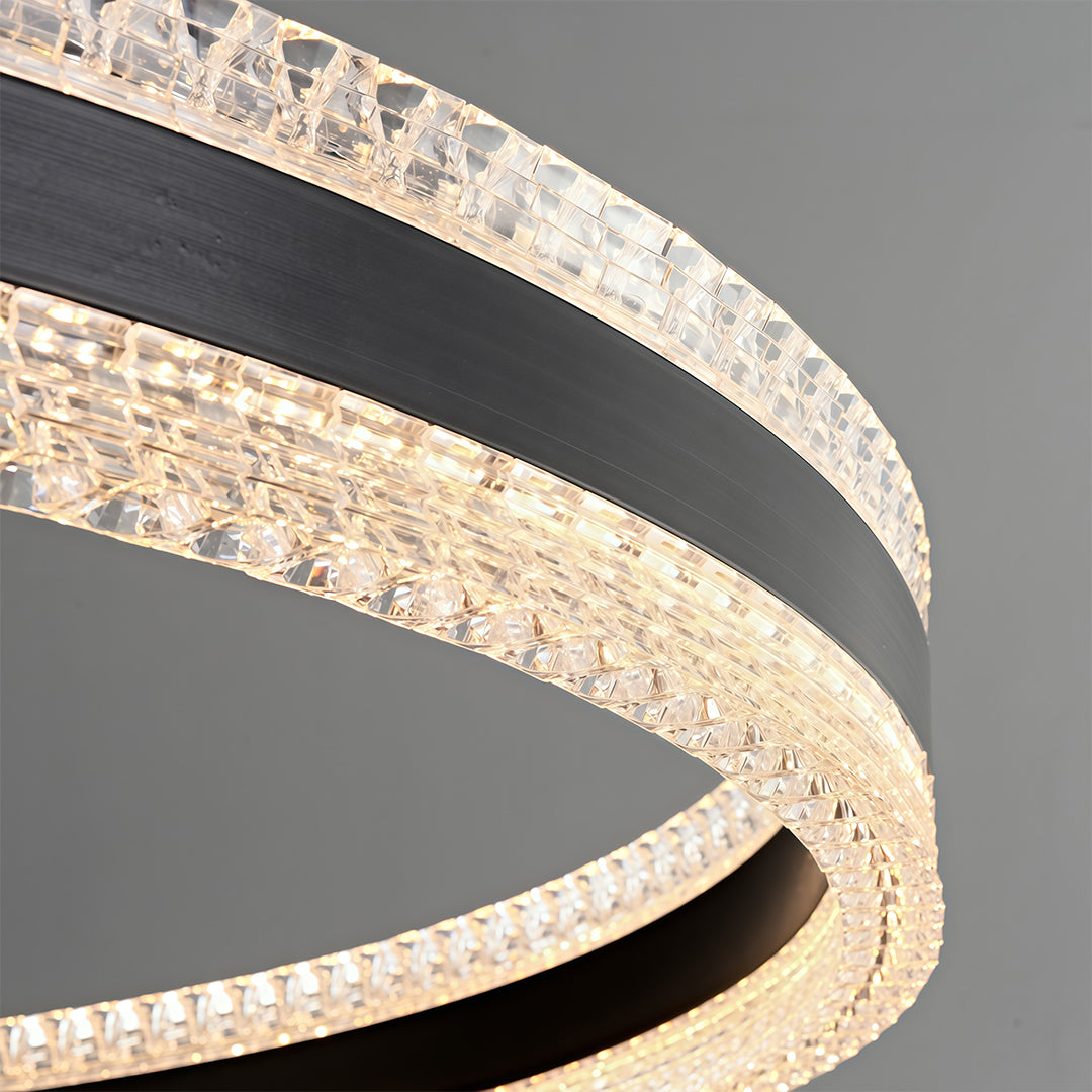 Elegant multi-tier modern round chandelier in a formal white dining room