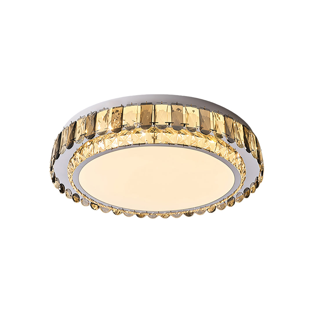 Modern round LED flush mount light with gold and crystal frame.