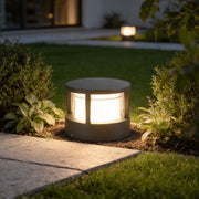 Modern round outdoor post light provides stylish and durable LED illumination for gardens, pathways, and patios.