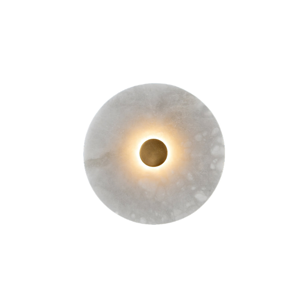 Modern round wall light with a warm center glow and marble shade isolated on white background