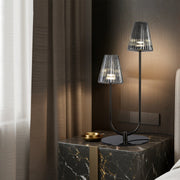 Modern table lamp with sculptural design illuminating contemporary living room side table