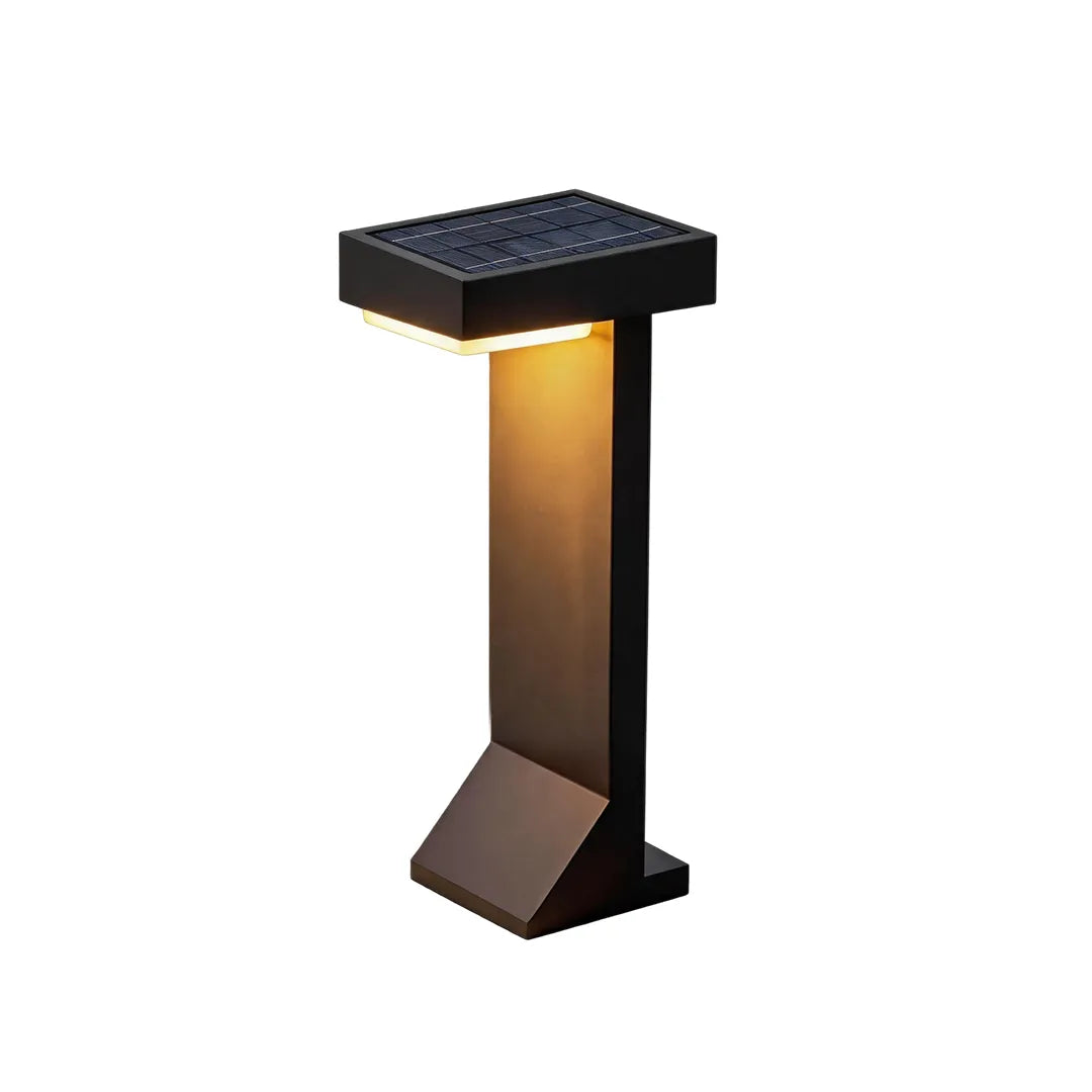Modern solar bollard light with integrated top solar panel and warm LED glow