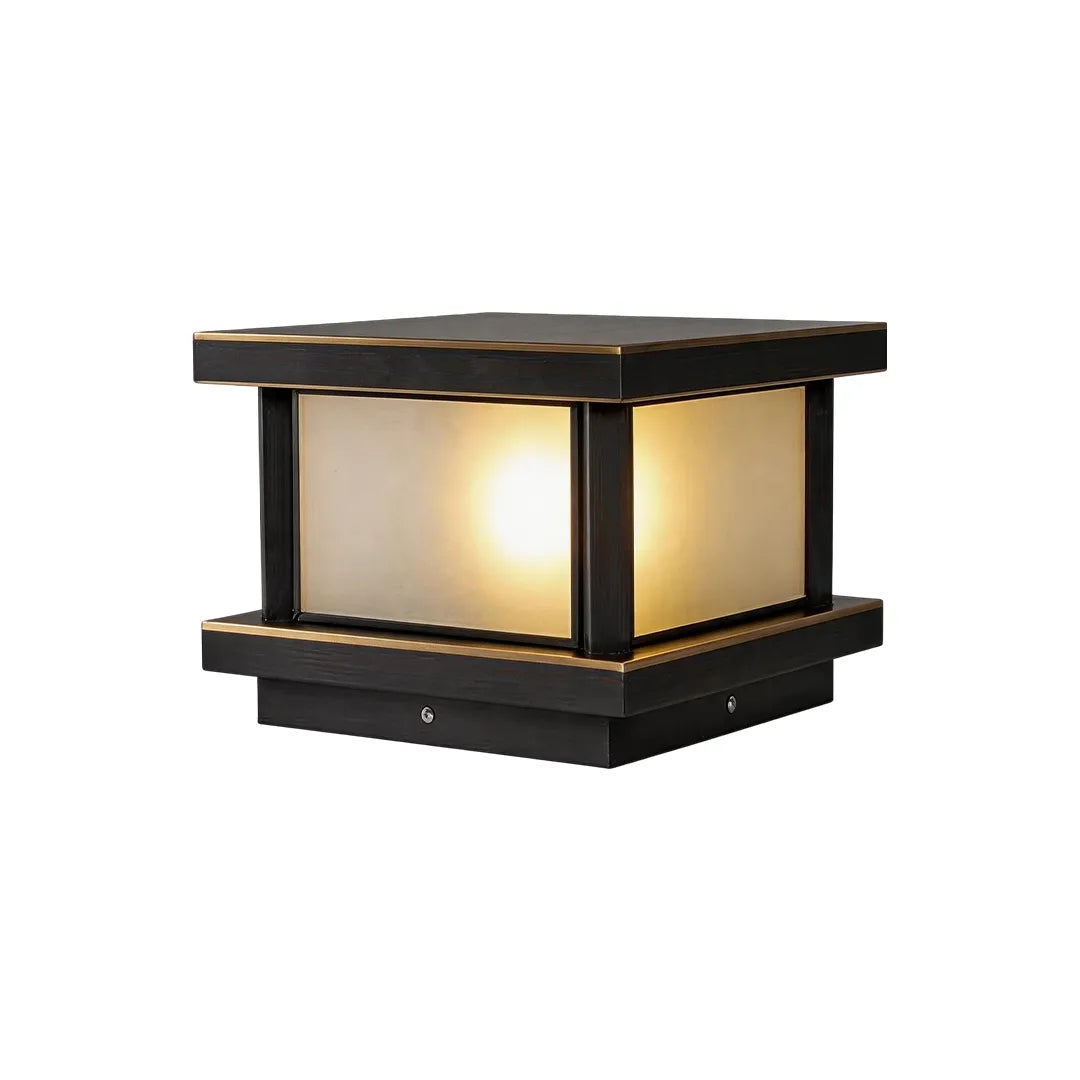 Modern solar pillar light with dark bronze frame and warm frosted glass