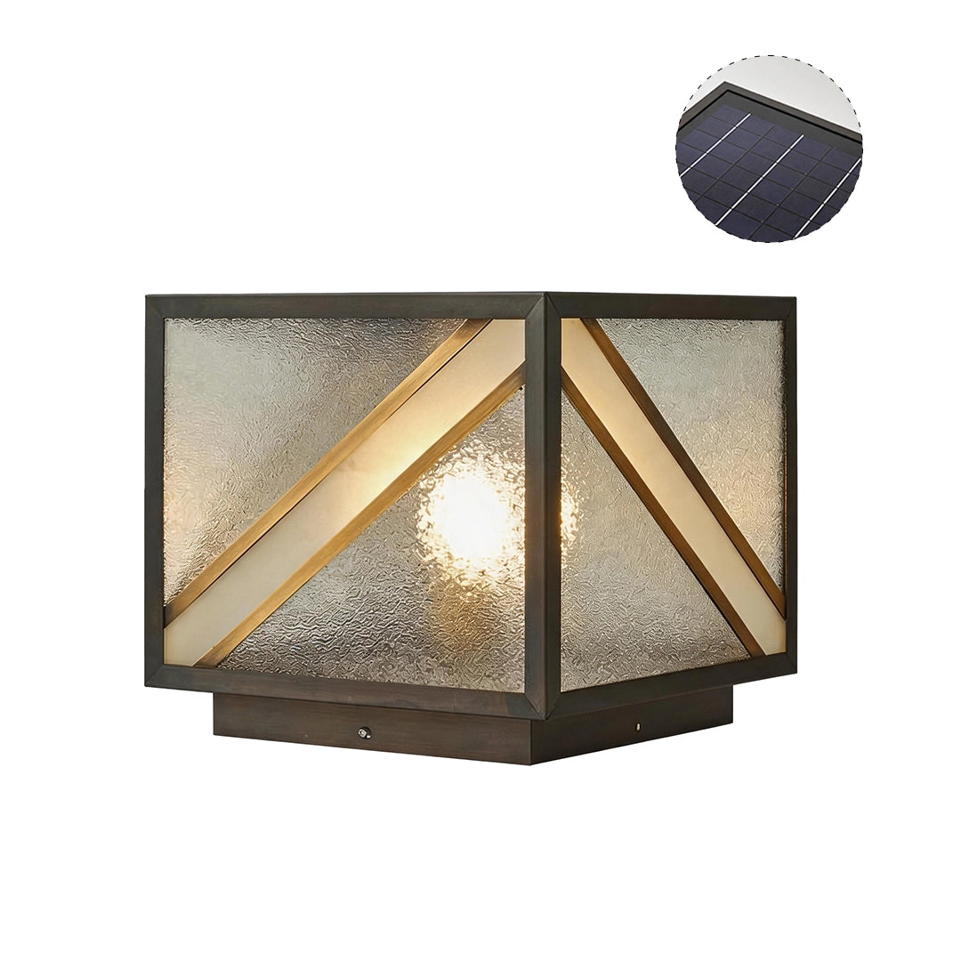 Modern solar pillar light with geometric gold accents textured glass and warm glow