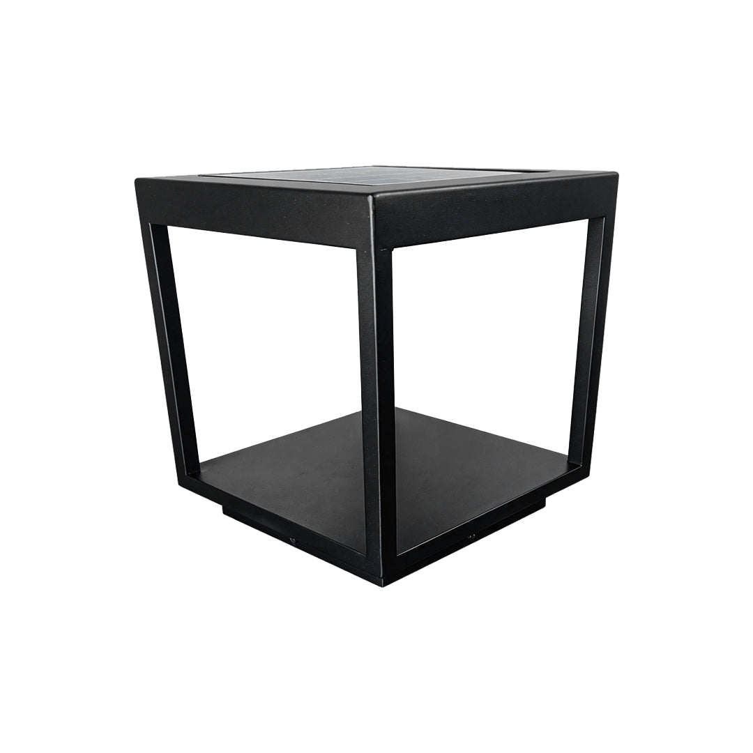 A modern square black concrete pillar light fixture isolated on clean white studio background.