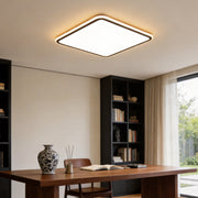 Modern square LED ceiling light providing bright illumination in a contemporary home office.