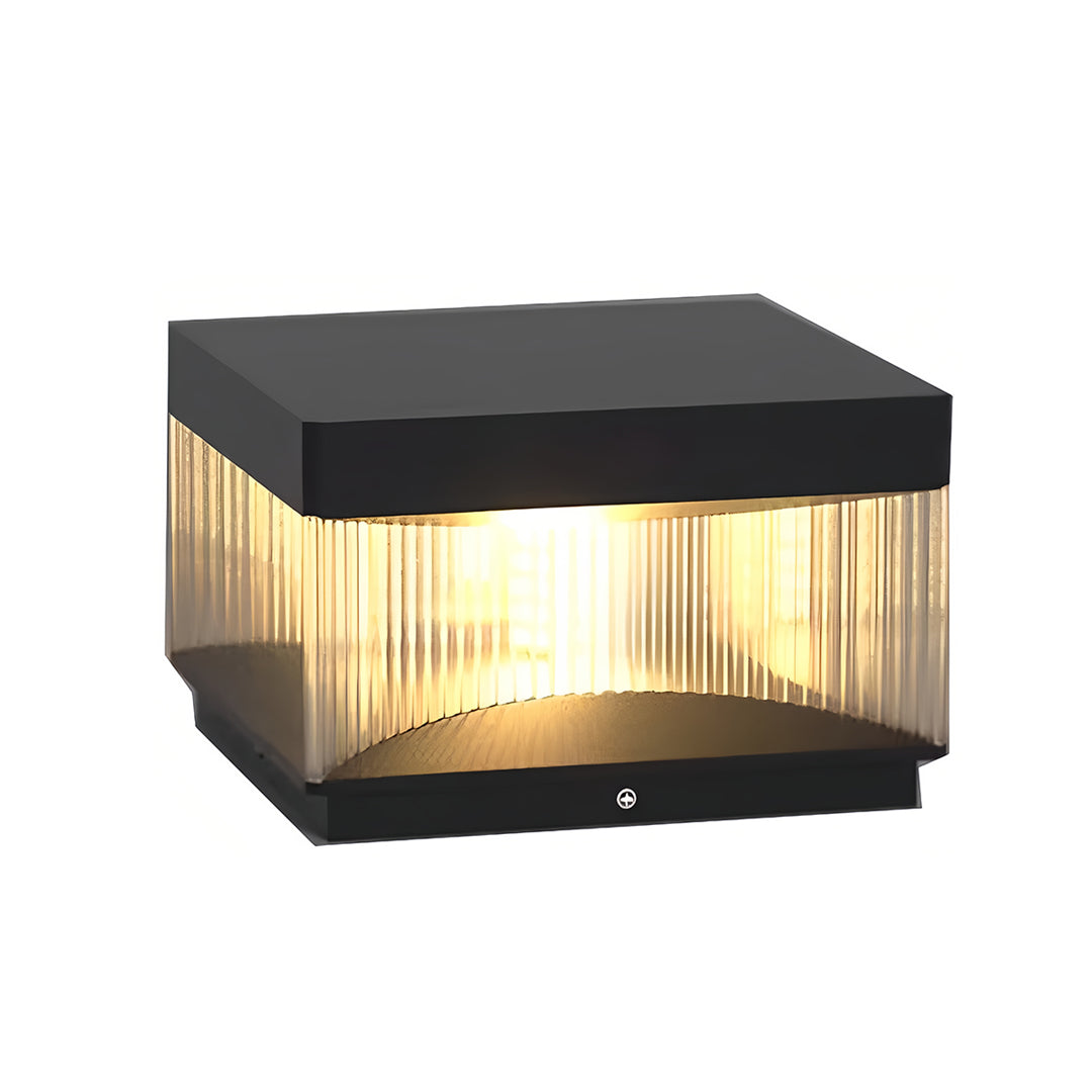 Modern square pillar lights with black housing and vertical ribbed glass diffuser panel