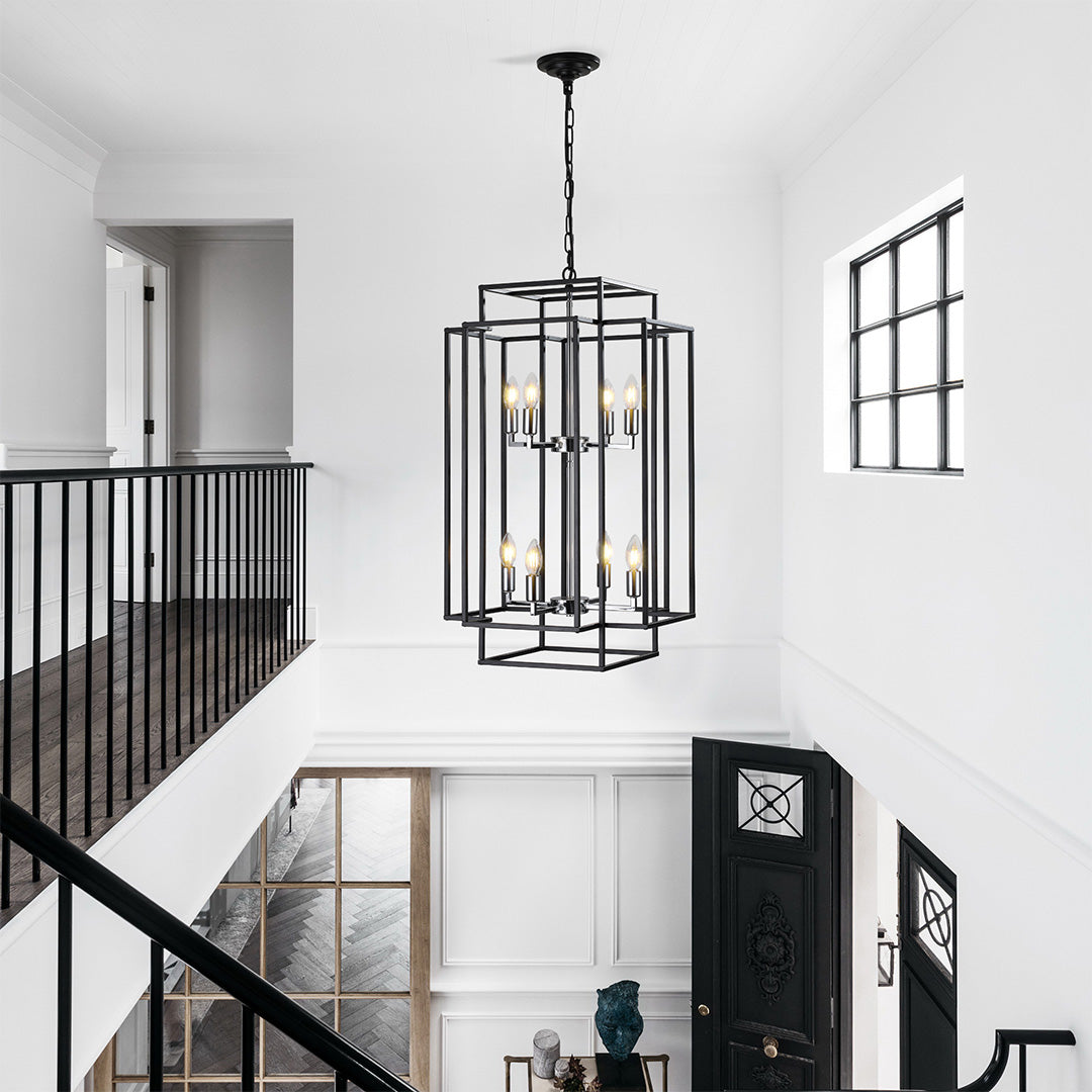 Black industrial vintage pendant light hanging in a modern staircase area, adding a rustic touch to contemporary interiors.
