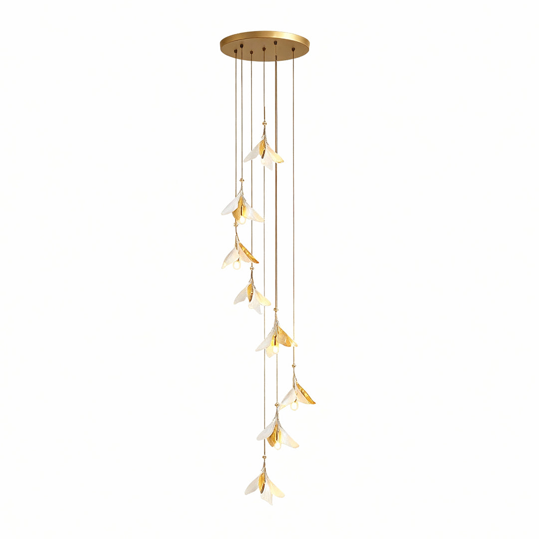 Modern staircase chandelier ideas showcasing spiral arrangement of glass flower pendants with brass hardware accents