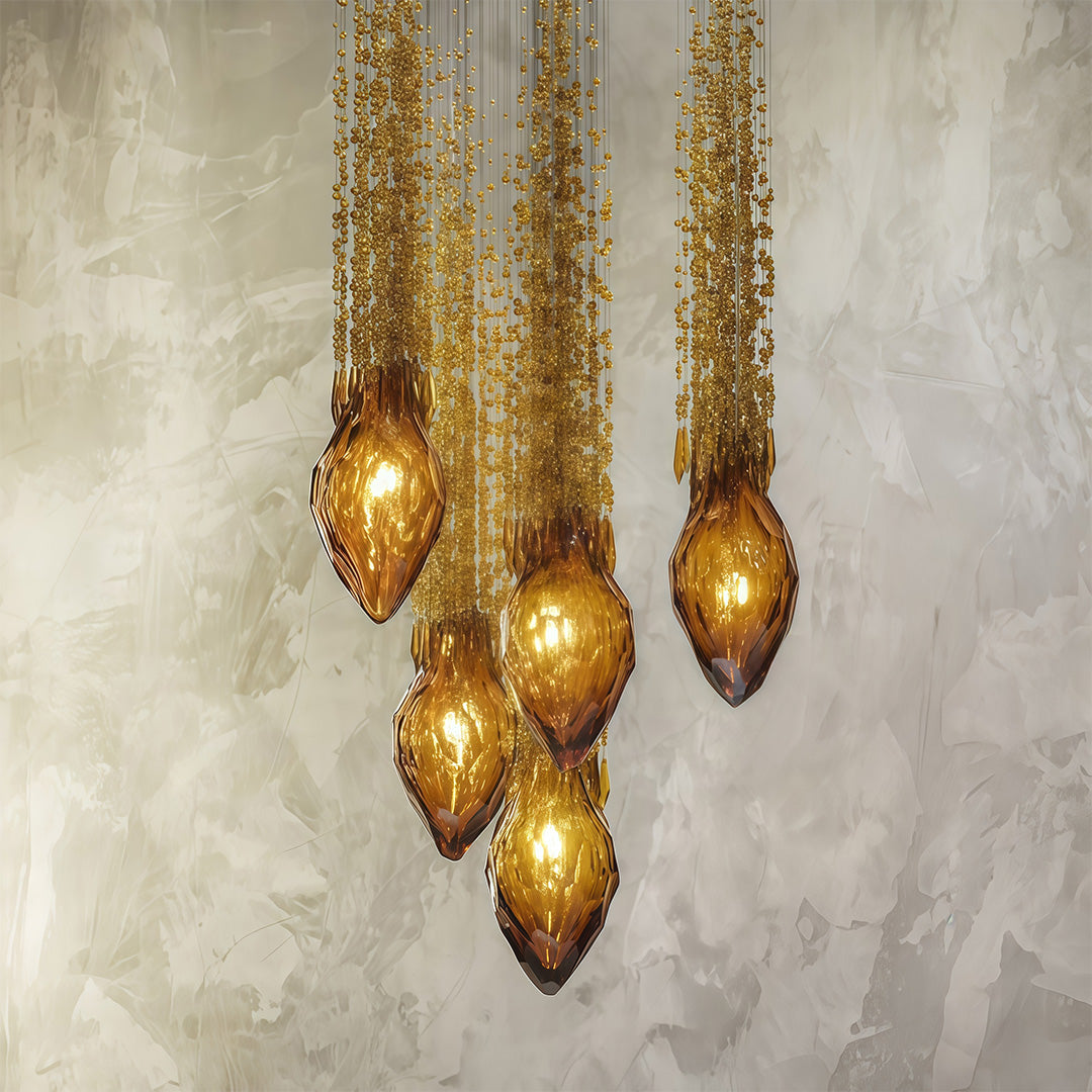 Artistic crystal stairway chandelier creates elegant vertical lighting, enhancing staircases with a refined and luxurious visual effect.