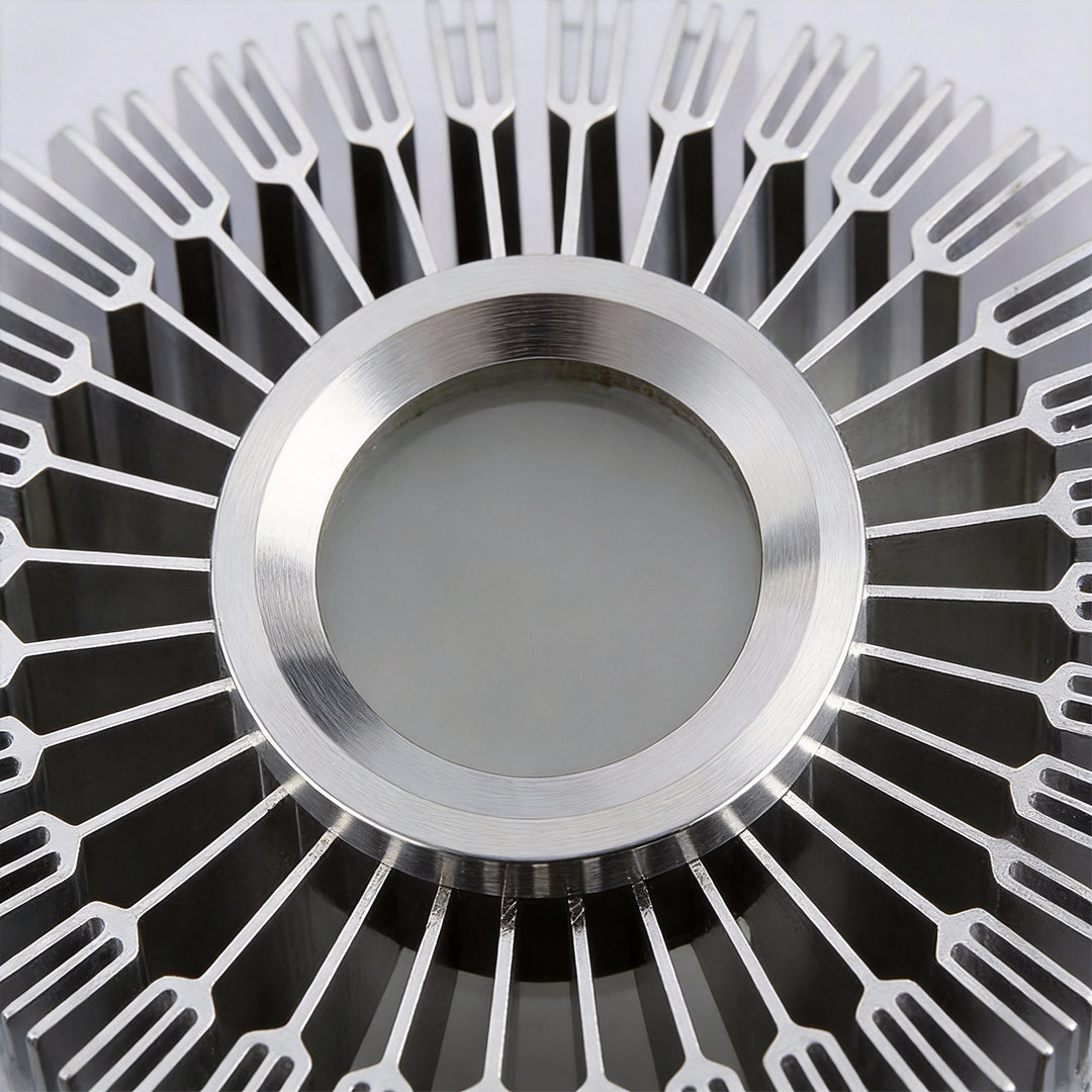 Modern sunburst ceiling fixture in silver, side view of the geometric design.