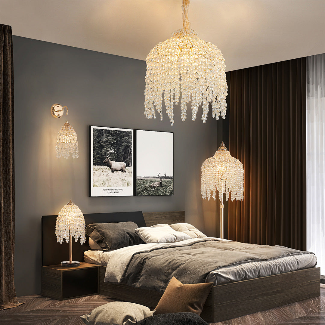 Bedroom lighting design featuring gold teardrop crystal chandelier for a soft and elegant ambiance.